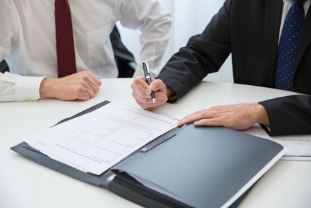 Business owner signing prenup agreement